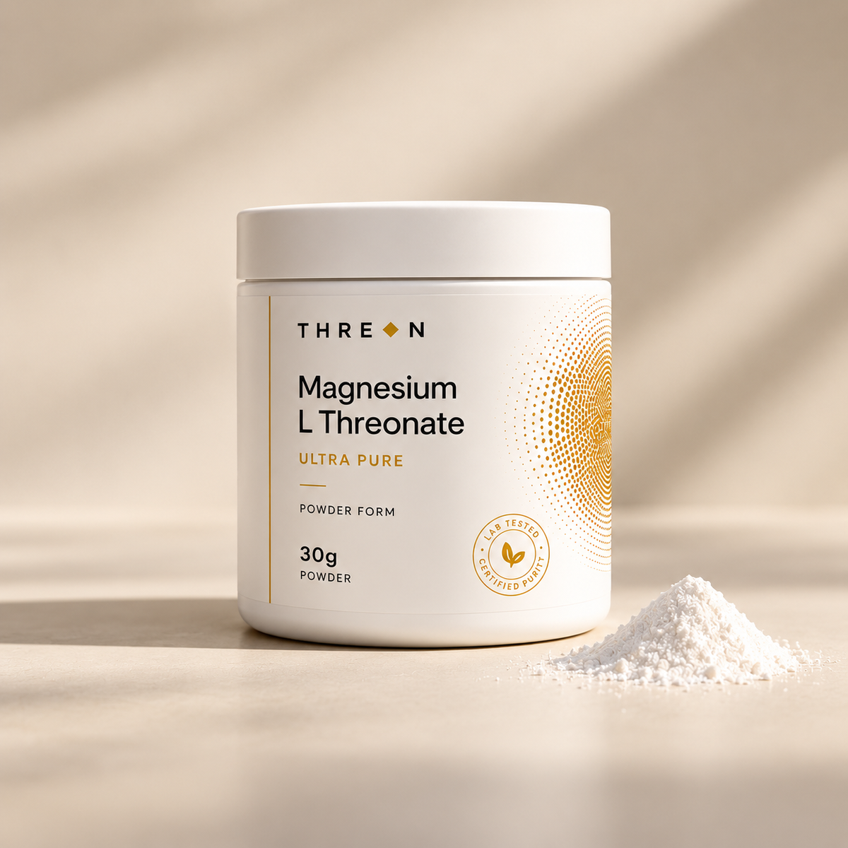 A white plastic jar of THREON Magnesium L Threonate Ultra Pure powder, shown on a warm beige surface with a small pile of white powder in the foreground and soft diagonal shadows.